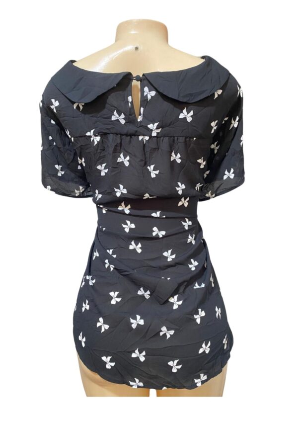 Blusa,Medidas 64cm de ancho y 85cm de largo, Marca Torrid, Talla 2 - Imagen 2