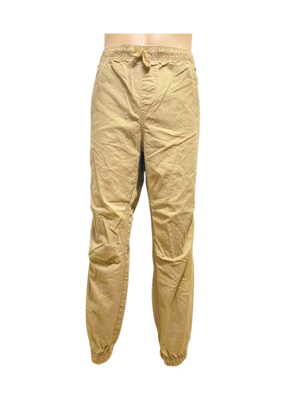 Jogger Café Claro, Medidas 47cm de ancho y 102 cm de largo, Marca NO BOUNDARIES, Talla L(36-38)