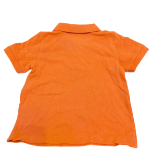 Camisa Naranja Nuevo ,Medidas 29cm de ancho y 43cm de largo, Marca CAT & JACK, Talla 2T