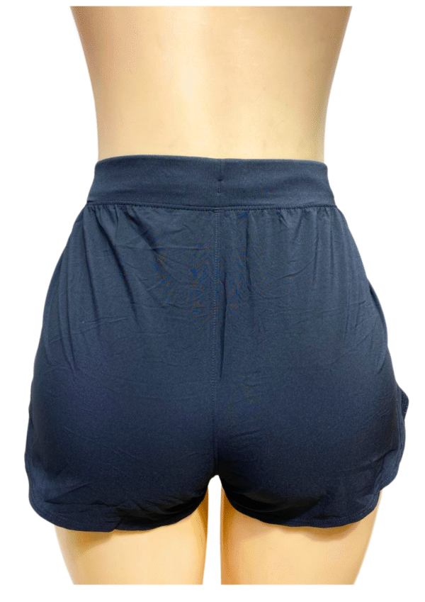 Short Negro, Nuevo ,Medidas 39cm de ancho y 24cm de largo, Marca UNDER AMOUR, Talla XL - Imagen 2